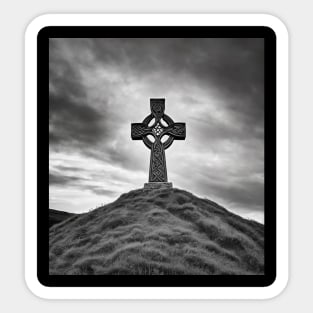 Ancient Stone Celtic Cross on a hill with the Sun shining through the cross in black and white. Sticker